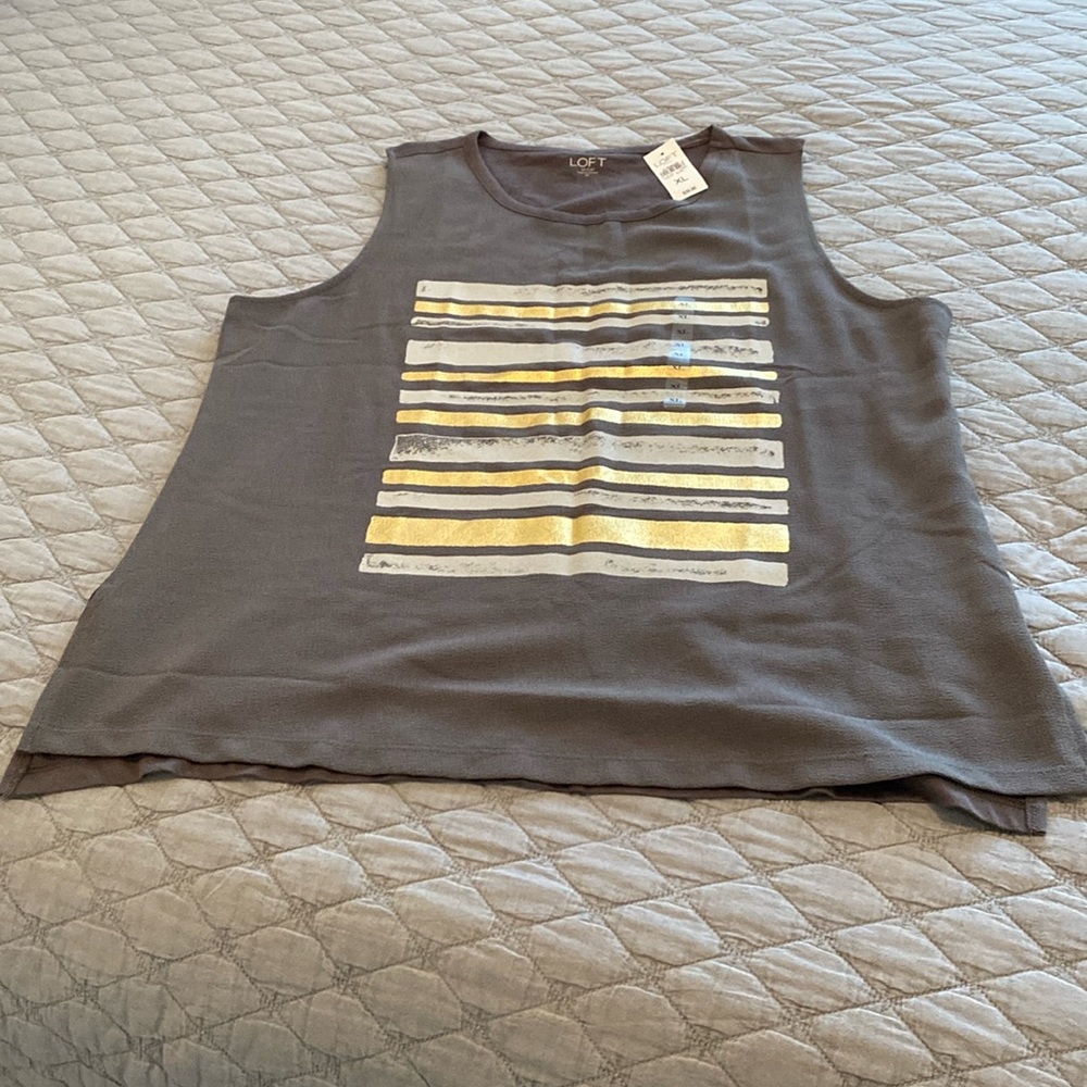 Loft Outlet Tank